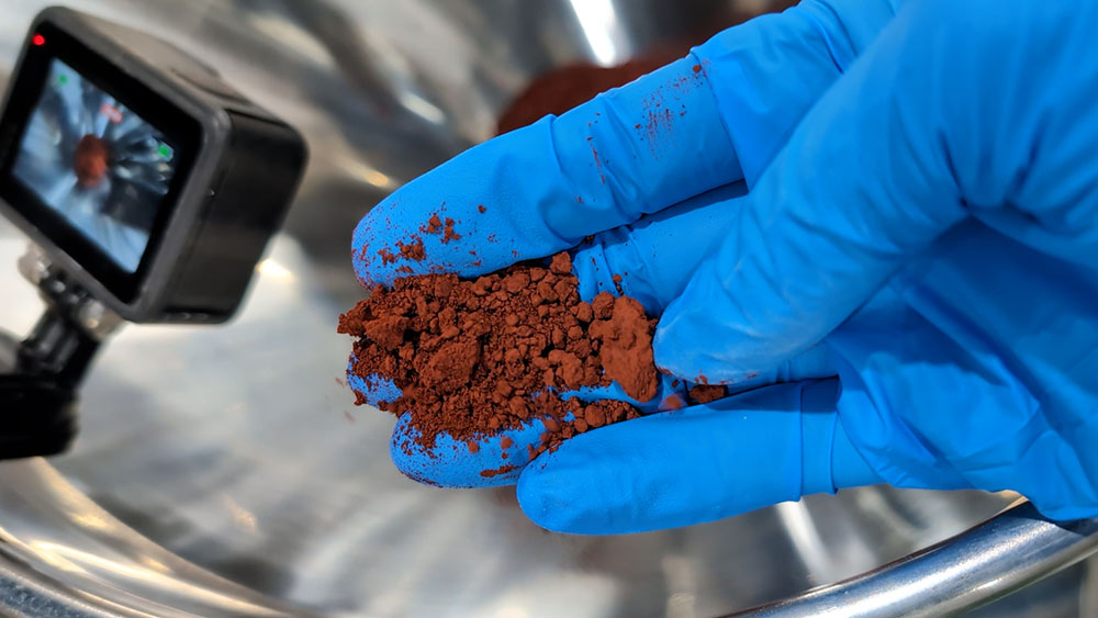 排出不良の原因となる大きな塊（凝集塊）が混じった状態の金属粉